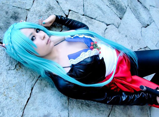 cosplay of Hatsune Miku the Vocaloid lying down