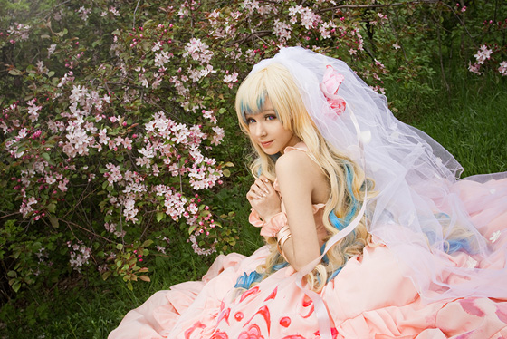 cosplay of Nia from Tenge Toppa Gurren Lagann holding arms together